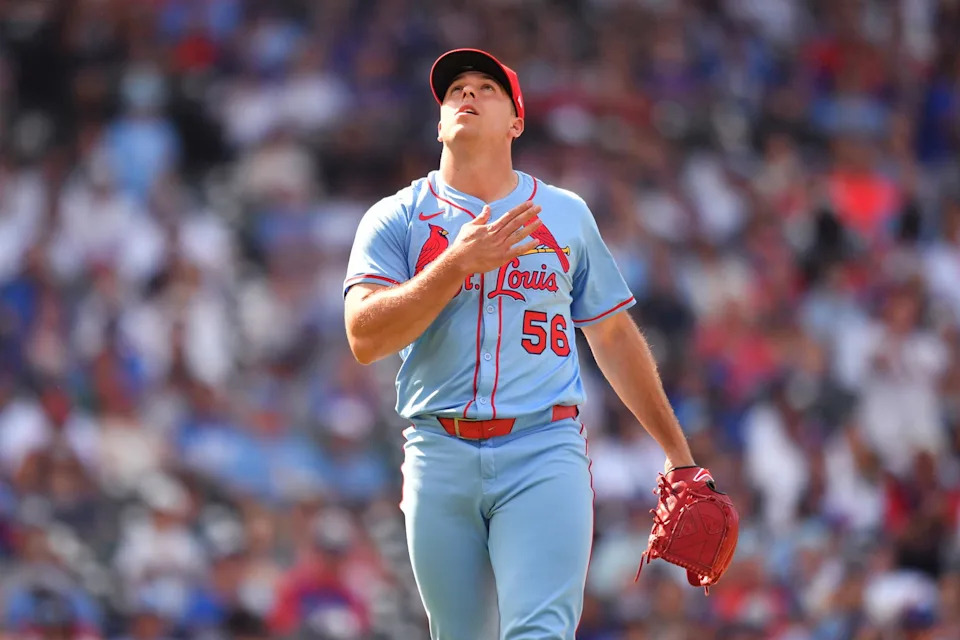 St. Louis Cardinals pitcher Ryan Helsley (56) celebrates after defeating the Chicago Cubs at Wrigley Field. Patrick Gorski-Imagn Images