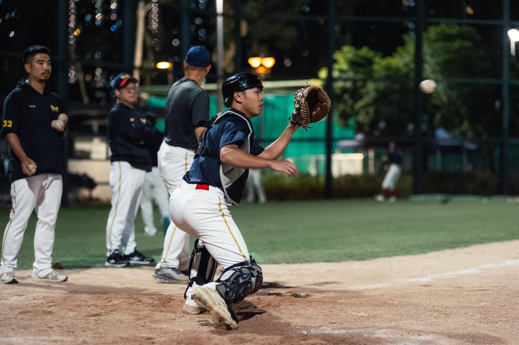 Egon Chan watches the ball into his glove during practice. Photo: BAHKC