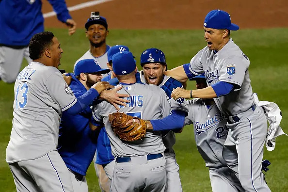 NEW YORK, NY – NOVEMBER 01: Wade Davis #17 of the Kansas City Royals and Drew Butera #9 of the Kansas City Royals celebrate with teammates after defeating the New York Mets to win Game Five of the 2015 World Series at Citi Field on November 1, 2015 in the Flushing neighborhood of the Queens borough of New York City. The Kansas City Royals defeated the New York Mets with a score of 7 to 2 to win the World Series. (Photo by Sean M. Haffey/Getty Images)