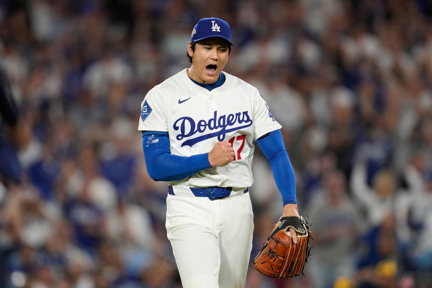 Los Angeles Dodgers' Shohei Ohtani reacts during Game 4 of the National League Championship Series against the Milwaukee Brewers in Los Angeles on Oct. 17. [AP/YONHAP]