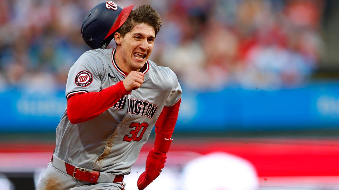 PHILADELPHIA, PENNSYLVANIA - MAY 18: Jacob Young #30 of the Washington Nationals rounds third base and scores on a single by CJ Abrams #5 against the Philadelphia Phillies during the fifth inning of a game at Citizens Bank Park on May 18, 2024 in Philadelphia, Pennsylvania.