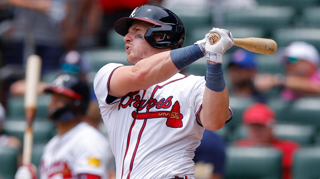 ATLANTA, GEORGIA - JUNE 19: Sean Murphy #12 of the Atlanta Braves hits a two run home run during the third inning against the Detroit Tigers at Truist Park on June 19, 2024 in Atlanta, Georgia.