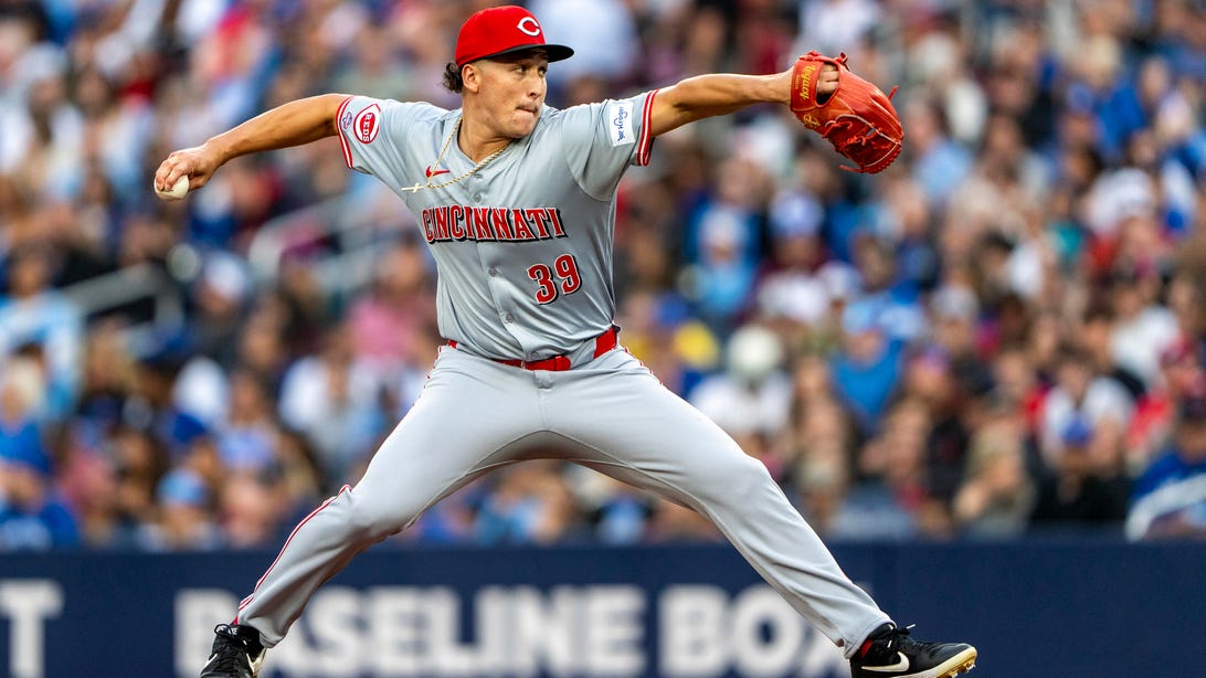 TORONTO, CANADA - AUGUST 19: Julian Aguiar #39 of the Cincinnati Reds makes his MLB debut against the Toronto Blue Jays during the first inning at Rogers Centre on August 19, 2024 in Toronto, Canada.