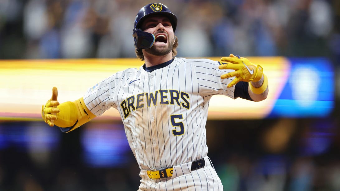 MILWAUKEE, WISCONSIN - OCTOBER 02: Garrett Mitchell #5 of the Milwaukee Brewers celebrates after hitting a home run in the eighth inning against the New York Mets during Game Two of the Wild Card Series at American Family Field on October 02, 2024 in Milw