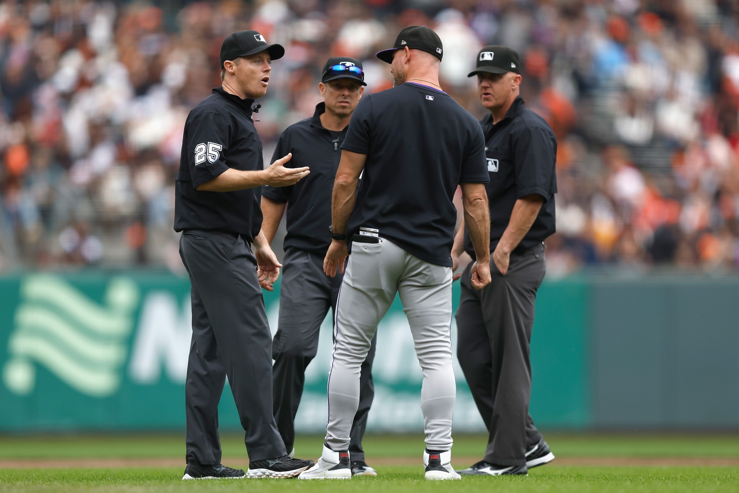 SAN FRANCISCO, CALIFORNIA - SEPTEMBER 28: Interim manager Warren Schaeffer #34 of the Colorado Rockies talks to the umpires during the game against the San Francisco Giants at Oracle Park on September 28, 2025 in San Francisco, California. (Photo by Lachlan Cunningham/Getty Images)