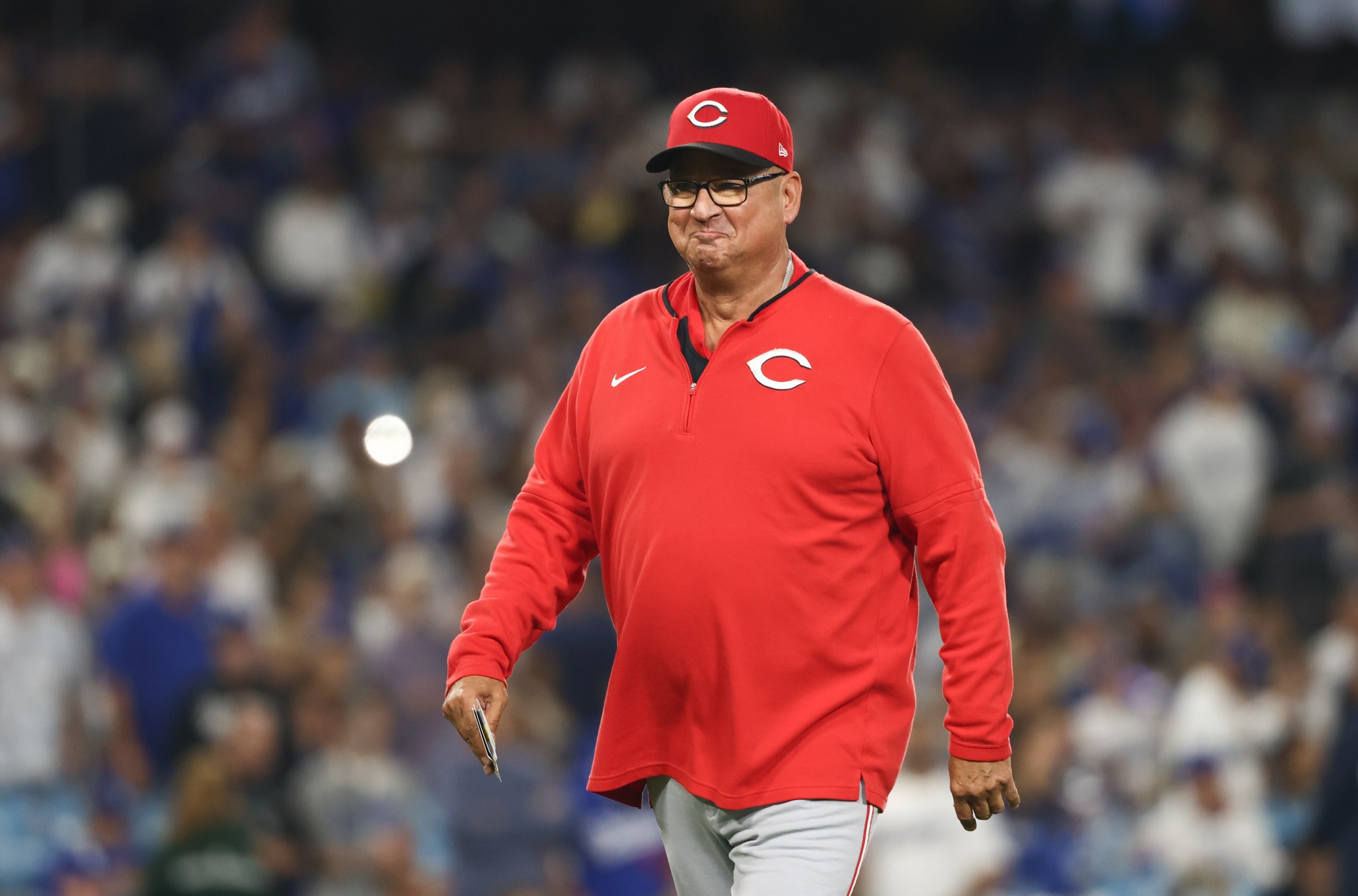LOS ANGELES, CA - OCTOBER 01: Manager Terry Francona #77 of the Cincinnati Reds smiles as he leaves the field during Game Two of the National League Wild Card Series between the Cincinnati Reds and the Los Angeles Dodgers at Dodger Stadium on Wednesday, October 1, 2025 in Los Angeles, California. (Photo by Katelyn Mulcahy/MLB Photos via Getty Images)