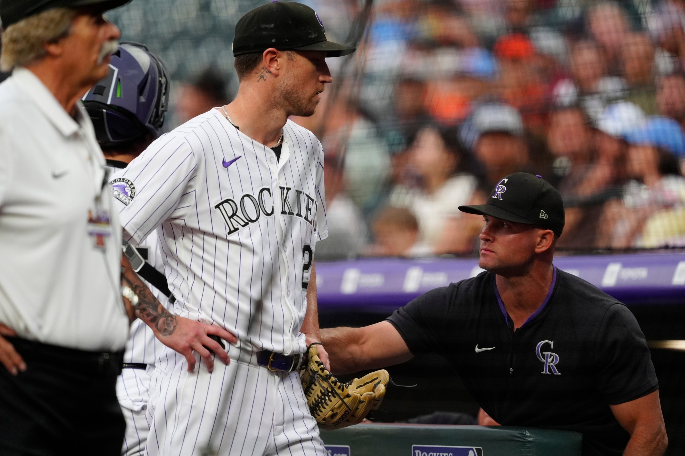 Sep 2, 2025; Denver, Colorado, USA; Colorado Rockies starting pitcher Kyle Freeland (21) is ejected from the game as interim manager Warren Schaeffer (34) reacts in the first inning against the San Francisco Giants at Coors Field. Mandatory Credit: Ron Chenoy-Imagn Images