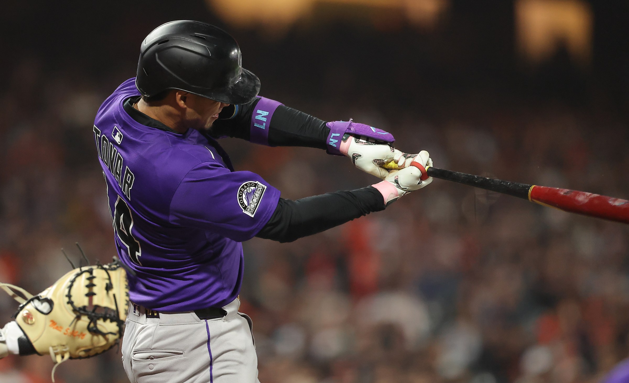 Sep 26, 2025; San Francisco, California, USA; Colorado Rockies shortstop Ezequiel Tovar (14) hits a three-run home run against the San Francisco Giants during the fifth inning at Oracle Park. Mandatory Credit: Kelley L Cox-Imagn Images