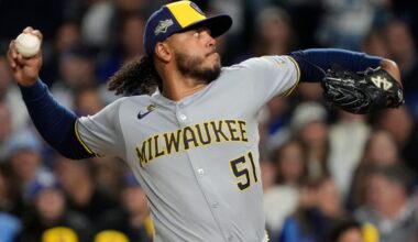 Brewers pick up Freddy Peralta’s option, Woodruff opts out