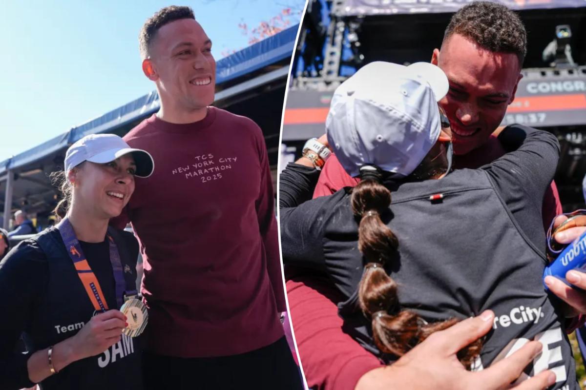 Aaron Judge hugs wife Samantha after 2025 NYC Marathon