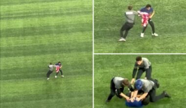 Fan runs onto field with American flag to delay World Series Game 6