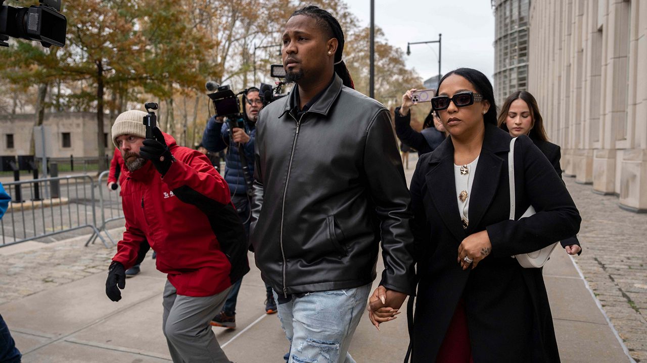 Cleveland Guardians' Luis Ortiz leaves Brooklyn federal court, Wednesday, Nov. 12, 2025, in New York. (AP Photo/Yuki Iwamura)