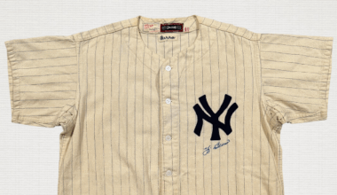 Yogi Berra's rookie jersey, perfect game pants top $550K at auction