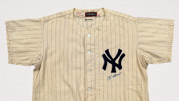 Yogi Berra's rookie jersey, perfect game pants top $550K at auction