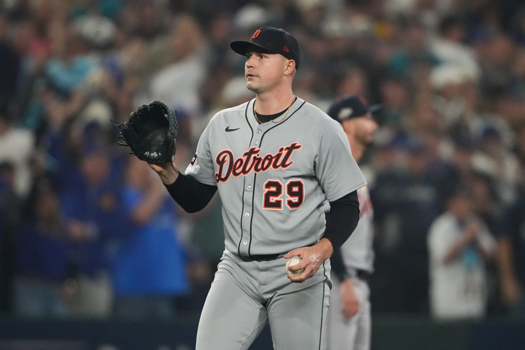 Detroit Tigers pitcher Tarik Skubal reacting after Mariners player Josh Naylor hit a double.