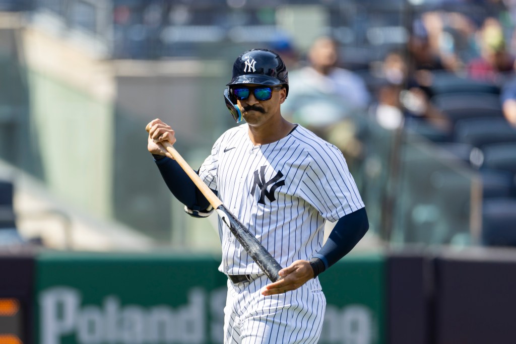 New York Yankees outfielder Trent Grisham (12) reacts as he walks back to the dugout after striking out in the 6th inning against the Houston Astros at Yankee Stadium, Sunday, Aug. 10, 2025, in Bronx, NY. 