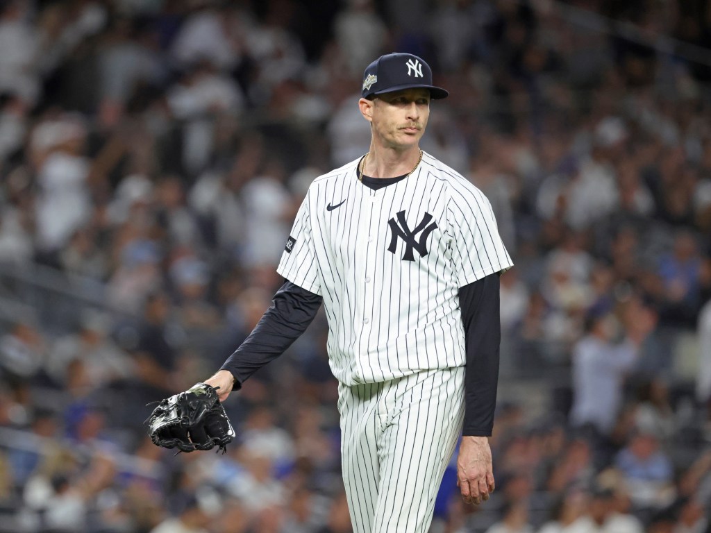 New York Yankees pitcher Tim Hill reacts after ending the 6th inning.