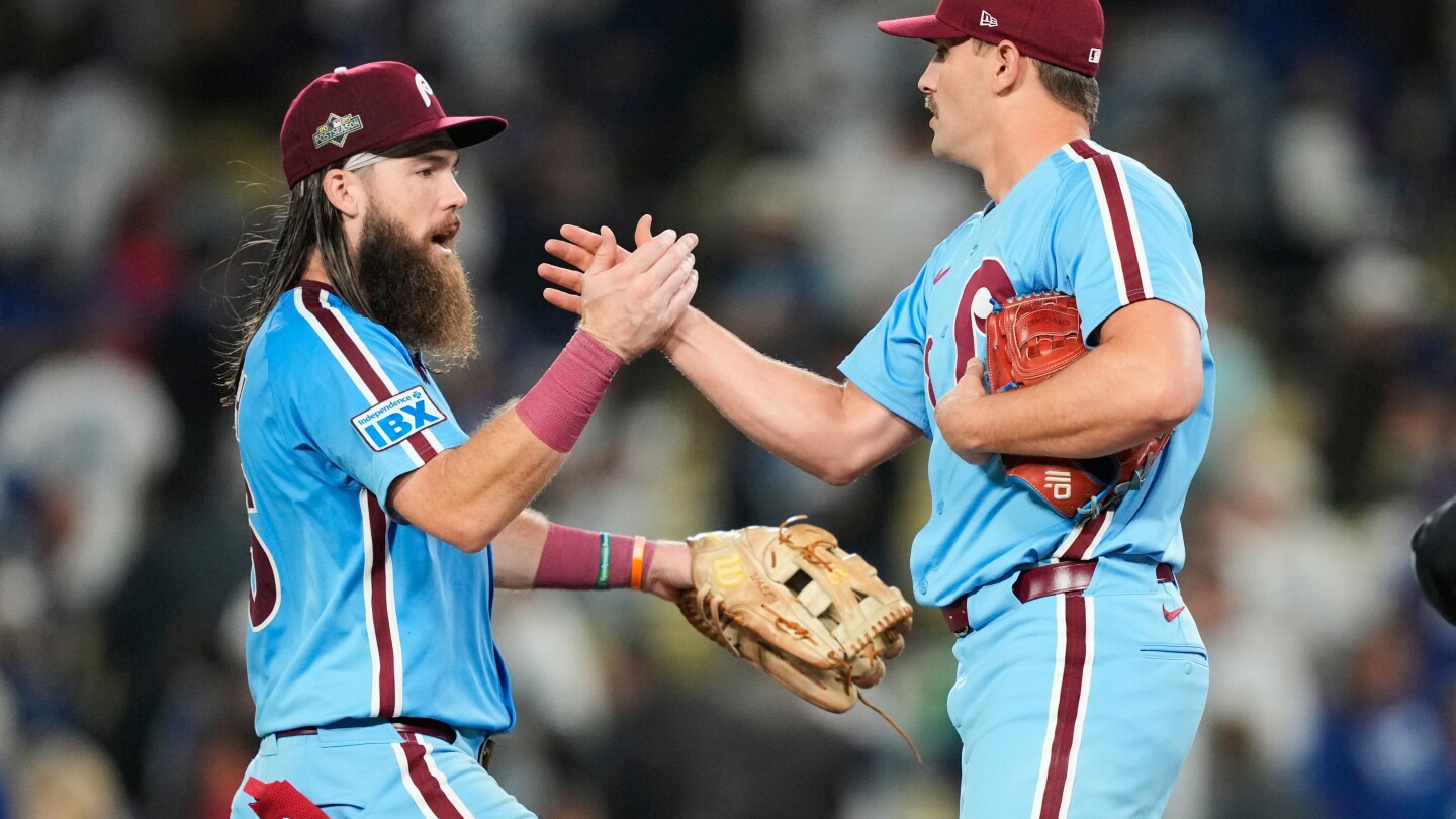 Kyle Schwarber hits two homers to lift Phillies over Dodgers 8-2 and avoid sweep in NLDS