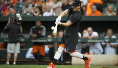 Brady Anderson is hired as the Angels' hitting coach, with John Mabry as his assistant