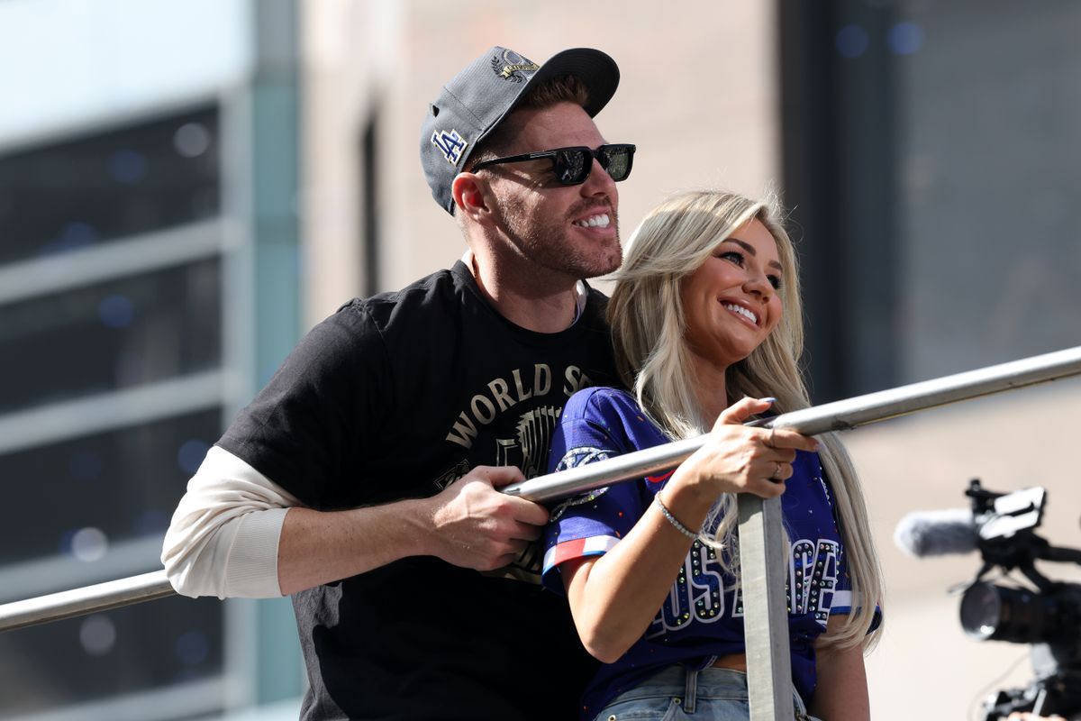 Nov 3, 2025; Los Angeles, CA, USA; Los Angeles Dodgers first baseman Freddie Freeman acknowledges the crowd during the World Series championship parade at downtown Los Angeles. Nov 3, 2025; Los Angeles, CA, USA; Los Angeles Dodgers first baseman Freddie Freeman acknowledges the crowd during the World Series championship parade at downtown Los Angeles.
