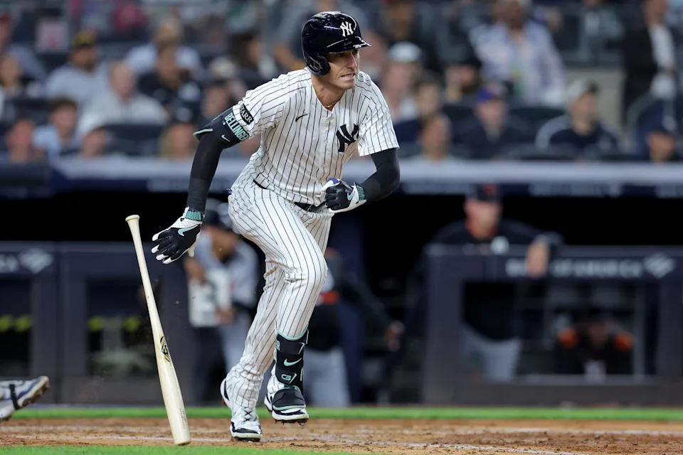 Sep 11, 2025; Bronx, New York, USA; New York Yankees center fielder Cody Bellinger (35) follows through on an RBI single against the Detroit Tigers during the fourth inning at Yankee Stadium. Mandatory Credit: Brad Penner-Imagn Images