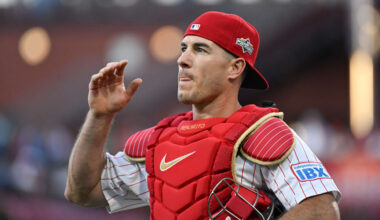 Oct 6, 2025; Philadelphia, Pennsylvania, USA; Philadelphia Phillies catcher J.T. Realmuto (10) walks to the dugout prior to game two of the NLDS round against the Los Angeles Dodgers for the 2025 MLB playoffs at Citizens Bank Park.