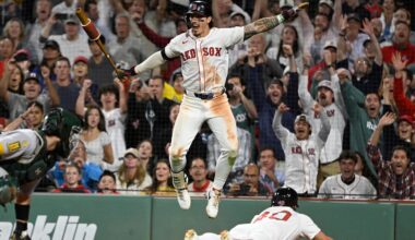 Sep 17, 2025; Boston, Massachusetts, USA; Boston Red Sox left fielder Jarren Duran (16) reacts as third baseman Nate Eaton (40) slides home to score the winning run against Athletics catcher Shea Langeliers (23) during the tenth inning at Fenway Park. Mandatory Credit: Eric Canha-Imagn Images