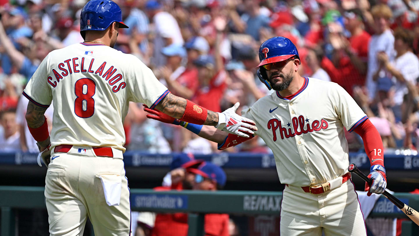Aug 24, 2025; Philadelphia, Pennsylvania, USA; Philadelphia Phillies outfielder Nick Castellanos (8) celebrates after scoring a run with outfielder Kyle Schwarber (12) during the second inning against the Washington Nationals at Citizens Bank Park.