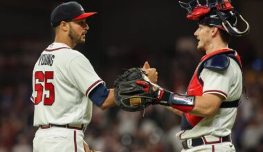May 9, 2023; Atlanta, Georgia, USA; Atlanta Braves relief pitcher Danny Young (65) and catcher Sean Murphy (12) celebrate after a victory against the Boston Red Sox at Truist Park.