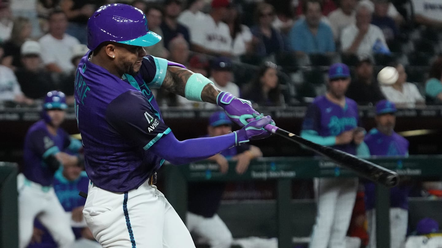 Sep 5, 2025; Phoenix, Arizona, USA; Arizona Diamondbacks second base Ketel Marte (4) hits against the Boston Red Sox in the first inning at Chase Field.