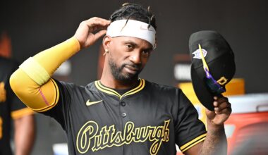 Sep 11, 2025; Baltimore, Maryland, USA;  Pittsburgh Pirates designated hitter Andrew McCutchen (22) stands in the dugout before the game between the Baltimore Orioles and the Pittsburgh Pirates at Oriole Park at Camden Yards. Mandatory Credit: James A. Pittman-Imagn Images