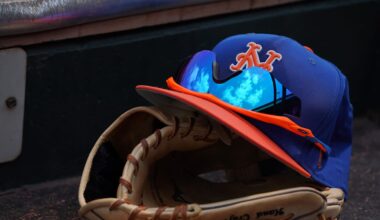 Mar 24, 2018; Jupiter, FL, USA; A New York Mets hat with sunglasses sits on a glove in the dugout during a spring training game between the St. Louis Cardinals and the New York Mets at Roger Dean Stadium. Mandatory Credit: Jasen Vinlove-Imagn Images