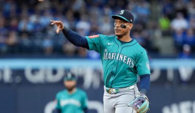 Oct 13, 2025; Toronto, Ontario, CAN; Seattle Mariners infielder Jorge Polanco (7) throws to first base for the first out in the third inning against the Toronto Blue Jays during game two of the ALCS round for the 2025 MLB playoffs at Rogers Centre. Mandatory Credit: Nick Turchiaro-Imagn Images