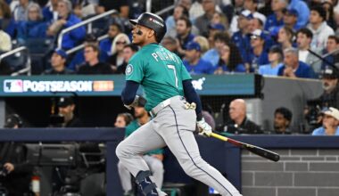 Oct 13, 2025; Toronto, Ontario, CAN; Seattle Mariners second baseman Jorge Polanco (7) hits a three run home run against the Toronto Blue Jays in the fifth inning during game two of the ALCS round for the 2025 MLB playoffs at Rogers Centre. Mandatory Credit: Dan Hamilton-Imagn Images