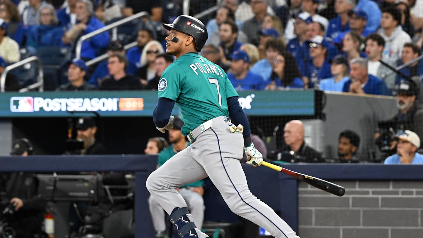 Oct 13, 2025; Toronto, Ontario, CAN; Seattle Mariners second baseman Jorge Polanco (7) hits a three run home run against the Toronto Blue Jays in the fifth inning during game two of the ALCS round for the 2025 MLB playoffs at Rogers Centre. Mandatory Credit: Dan Hamilton-Imagn Images