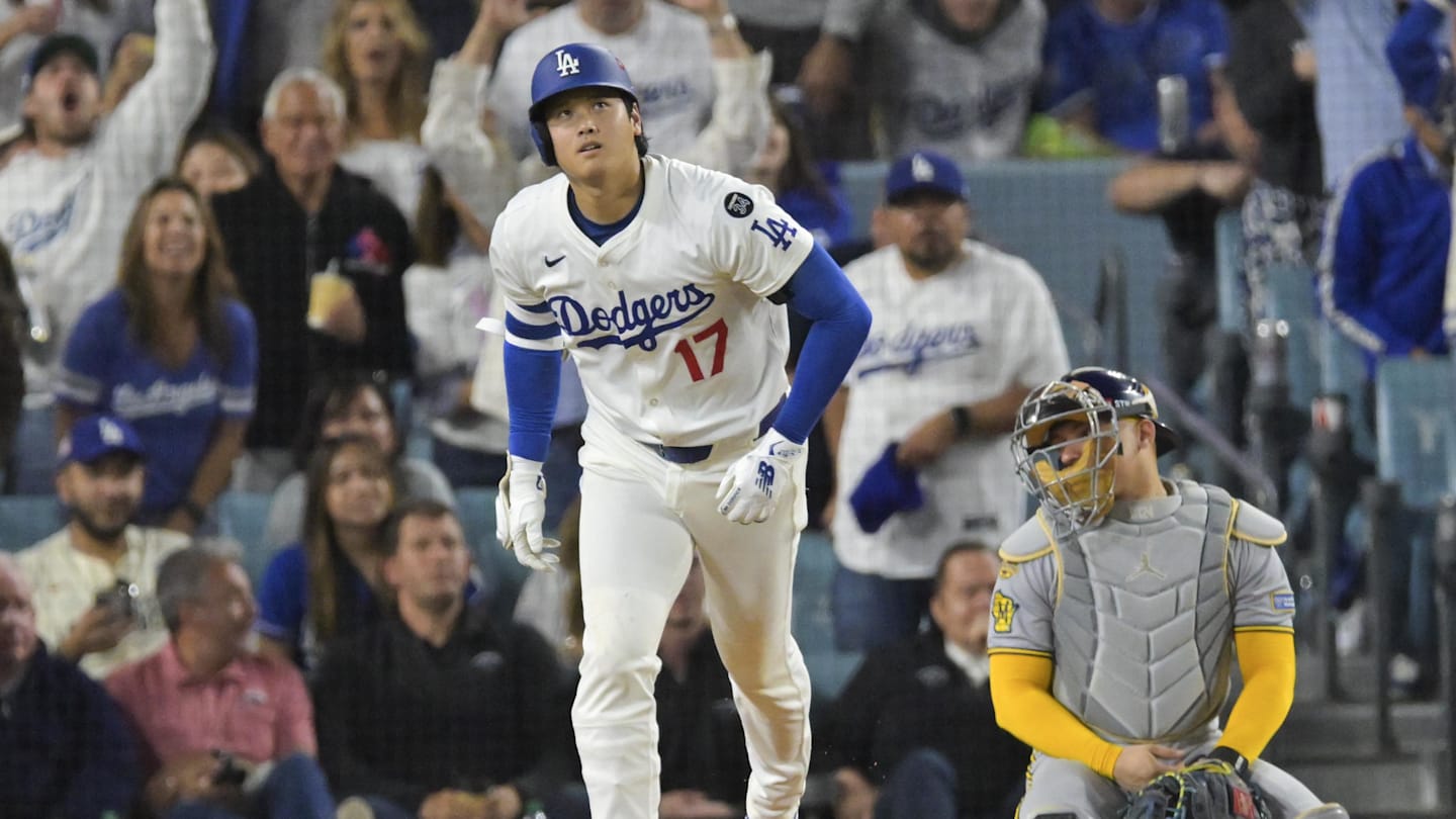 Oct 17, 2025; Los Angeles, California, USA; Los Angeles Dodgers two-way player Shohei Ohtani (17) runs on a solo home run as Milwaukee Brewers catcher William Contreras (24) reacts during the fourth inning of game four of the NLCS round for the 2025 MLB playoffs at Dodger Stadium. Mandatory Credit: Jayne Kamin-Oncea-Imagn Images