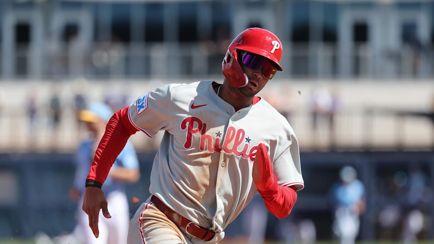 Feb 25, 2025; Port Charlotte, Florida, USA;  Philadelphia Phillies outfielder Justin Crawford (80) runs home to score against the Tampa Bay Rays during the fourth inning at Charlotte Sports Park. Mandatory Credit: Kim Klement Neitzel-Imagn Images