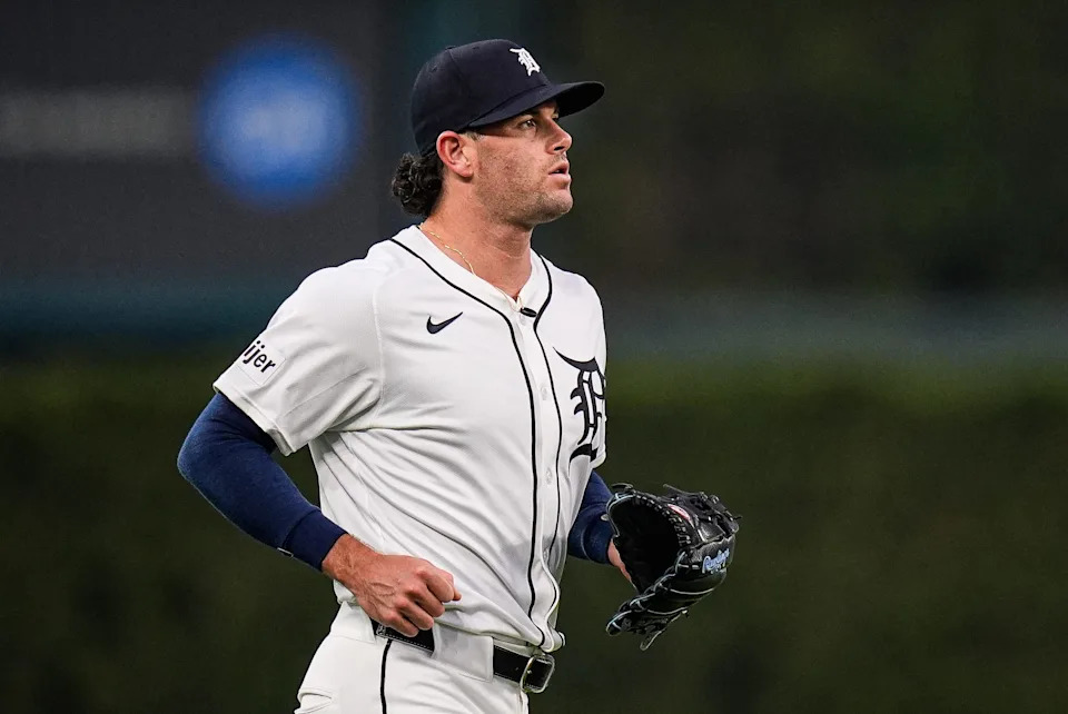 Detroit Tigers pitcher Kyle Finnegan (64) runs out of the bullpen for ninth inning against Minnesota Twins at Comerica Park in Detroit in Monday, August 4, 2025.
