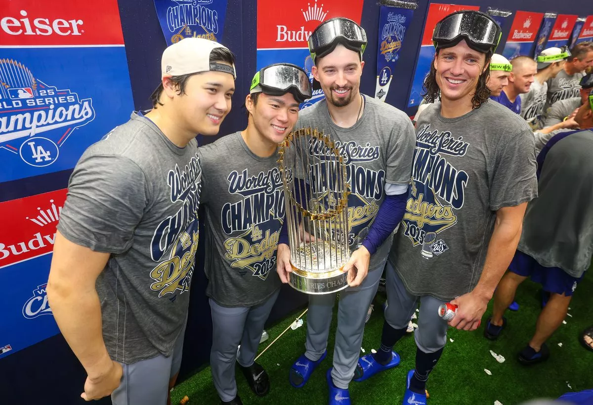 Los Angeles Dodgers pitchers Shohei Ohtani, Yoshinobu Yamamoto, Blake Snell, and Tyler Glasnow celebrating the World Series