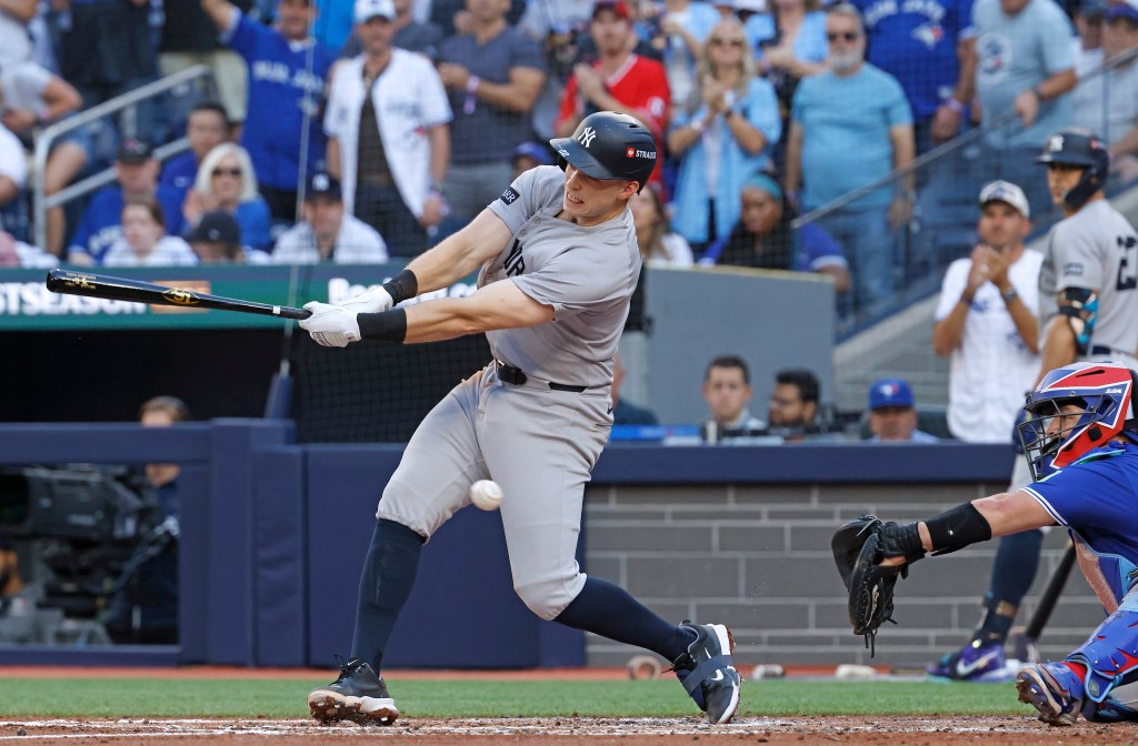 Ben Rice #22 of the New York Yankees strikes out swinging during the fourth inning.