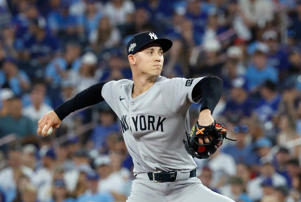 New York Yankees Vs. Toronto Blue Jays at Rogers Centre: Luke Weaver #30 of the New York Yankees throws a pitch during the 8th inning. 