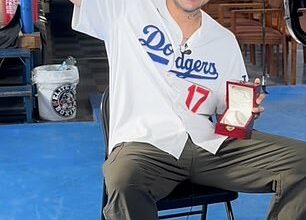 David Flores managed to catch the third of Shohei Ohtani's home runs during the NLCS Game 4 win