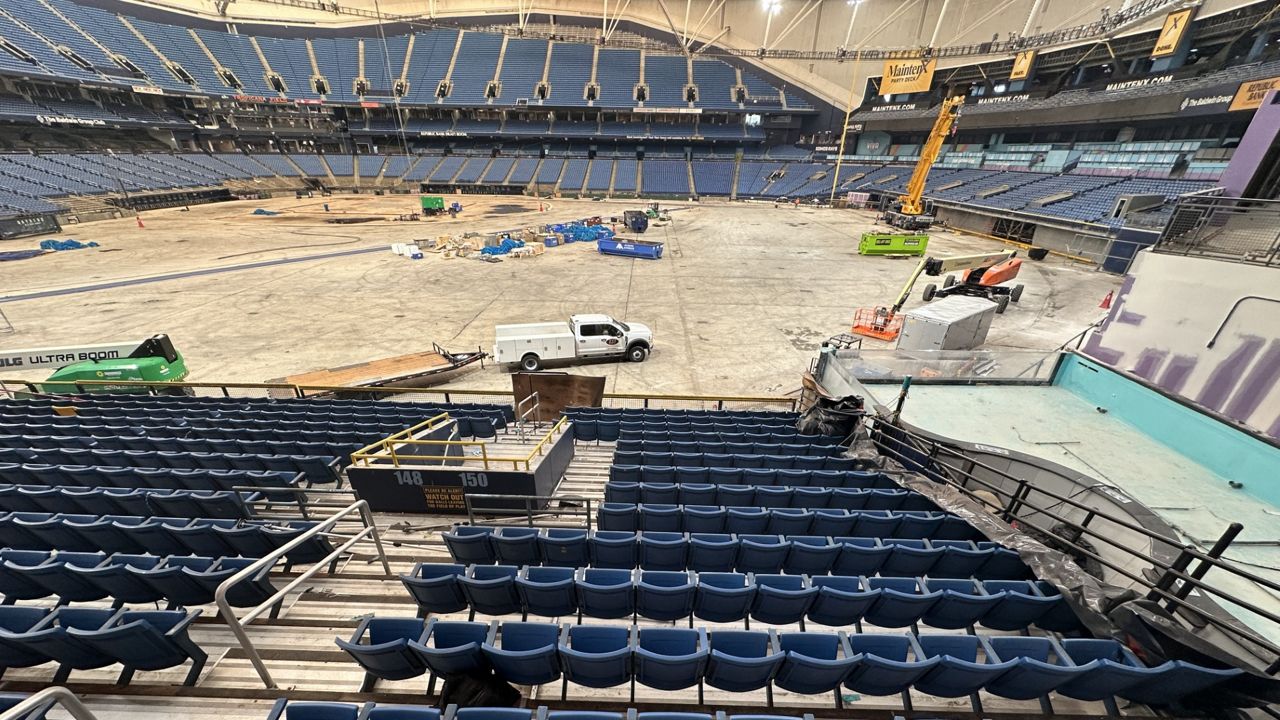 With roof fixed, cleanup continues inside Tropicana Field