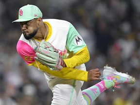 San Diego Padres relief pitcher Robert Suarez throws pitch against the Los Angeles Dodgers during a game this past season.