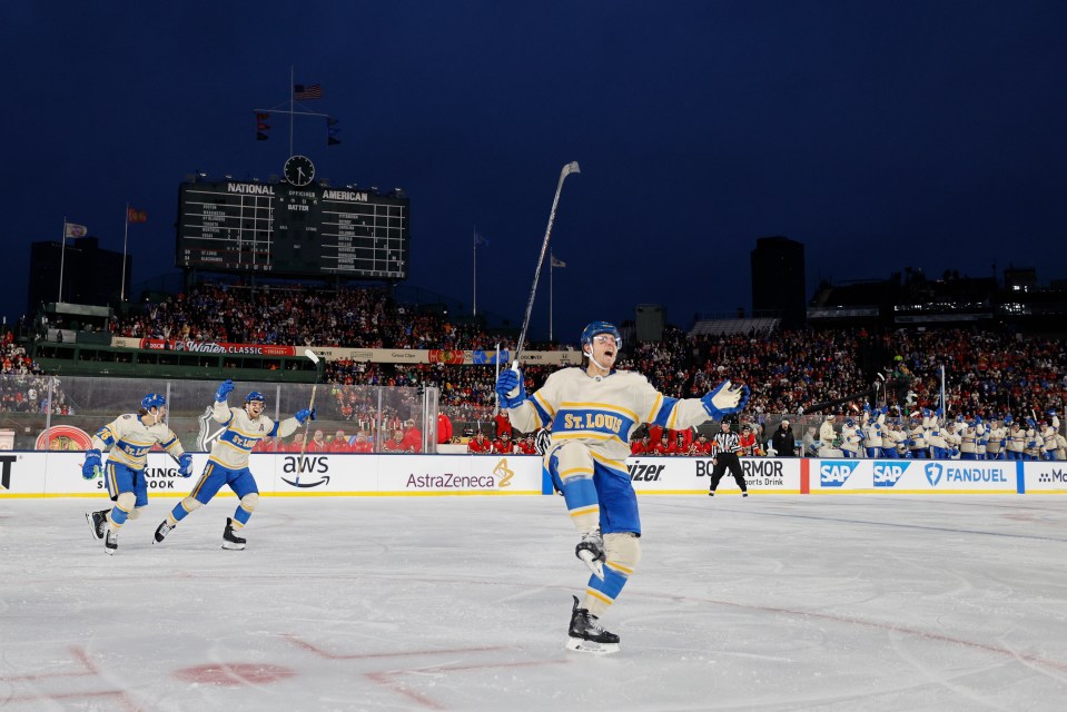 Cam Fowler #17 of the St. Louis Blues celebrates after a goal during the first period against the Chicago Blackhawks during the 2024 NHL Winter Classic at Wrigley Field on December 31, 2024