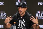New York Yankees manager Aaron Boone talks to reporters at Yankee Stadium in New York, Oct. 6, 2025. (AP Photo/Seth Wenig)
