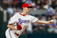 Texas Rangers relief pitcher Hoby Milner (41) throws during the seventh inning of an MLB...