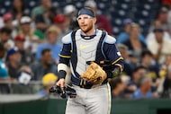 Milwaukee Brewers catcher Danny Jansen looks on during the fourth inning of a baseball game...