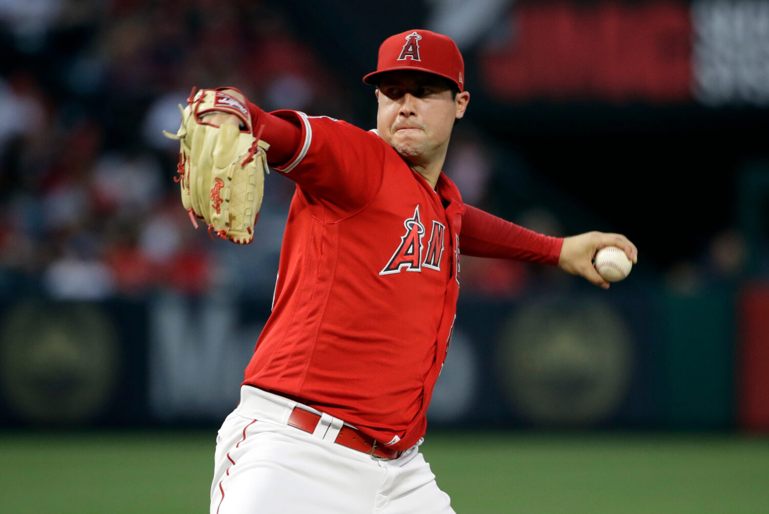 FILE - In this June 29, 2019, file photo, Los Angeles Angels starting pitcher Tyler Skaggs throws t...