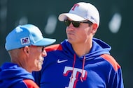 Texas Rangers president of baseball operations Chris Young (right) and pitching coach Mike...